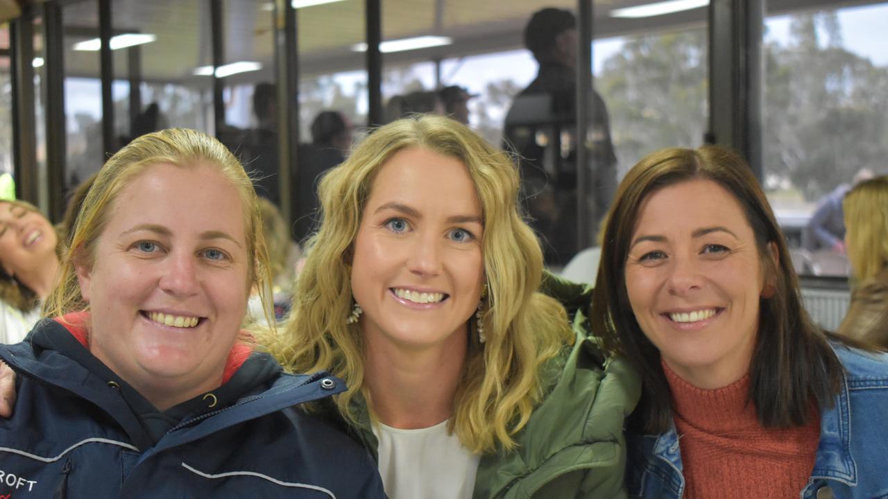 Women's team captain Lisa Croft with Bec Rogers and Michelle Byrne at the 2021 Warwick Cowboys Ladies' Day.