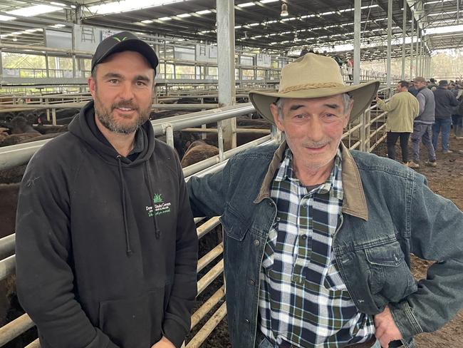 Grant Sims, left, sold two pens of highly sought after Angus calves which achieved a top of $2340 or 870c/kg. They were bought by Jack Coldar from Koonwarra, right.