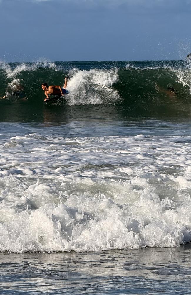 Board riders were being crunched in the big swell at Mooloolaba late Thursday afternoon as Tropical Cyclone Alfred hovered off the Qld coastline. Photo: Mark Furler