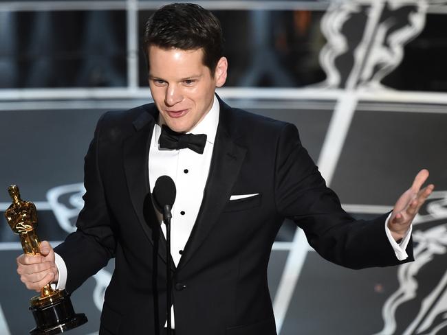 Graham Moore accepts the Academy Award for Best Adapted Screenplay for The Imitation Game.