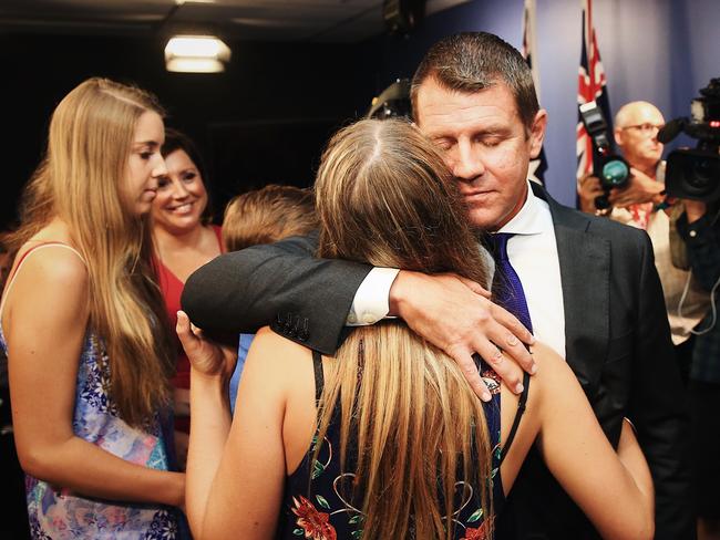 Premier Mike Baird resigns from the job and from politics. He was supported by his family as he fronted the media. Picture: Dylan Robinson.