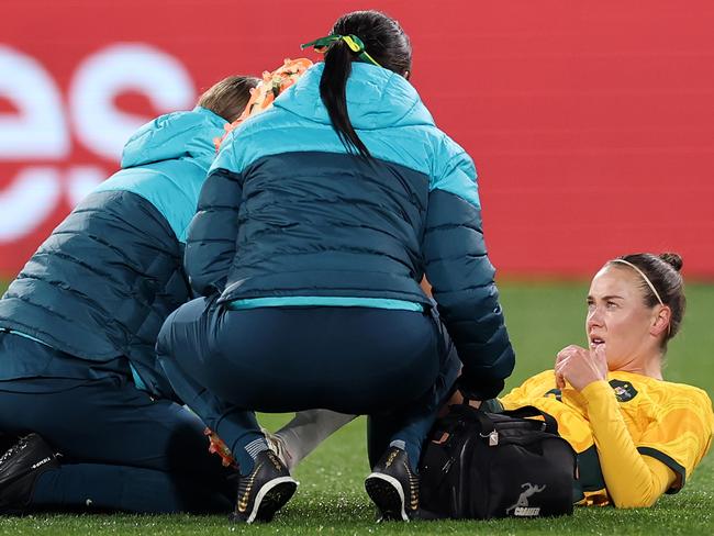 ADELAIDE, AUSTRALIA - MAY 31: Caitlin Foord of Australia is attended to by trainers after an injury during the international friendly match between Australia Matildas and China PR at Adelaide Oval on May 31, 2024 in Adelaide, Australia. (Photo by Cameron Spencer/Getty Images)