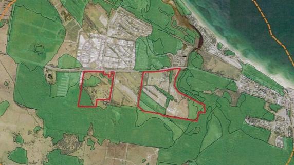 The properties (in red) which relate to the Site R & D development application for a residential subdivision in the West Byron Urban Release Area along Ewingsdale Road, close to the Byron Bay township (right). The Harvest Estate area sits between the two Site R & D properties.