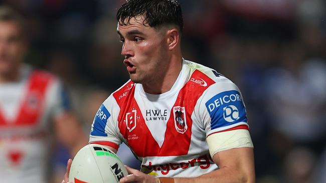 SYDNEY, AUSTRALIA - AUGUST 10: Kyle Flanagan of the Dragons runs the ball during the round 23 NRL match between St George Illawarra Dragons and Canterbury Bulldogs at Netstrata Jubilee Stadium, on August 10, 2024, in Sydney, Australia. (Photo by Jeremy Ng/Getty Images)