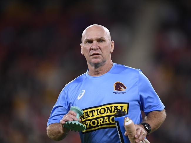 Allan Langer's days as Brisbane's 'blue shirt' trainer are over.