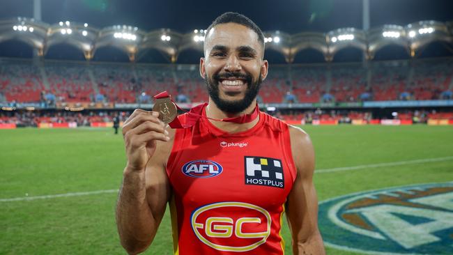 Touk Miller with the Marcus Ashcroft Medal for his efforts in the QClash. (Photo by Russell Freeman/AFL Photos via Getty Images)