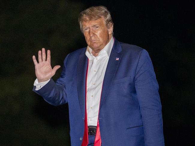 President Donald Trump walks on the South Lawn of the White House in Washington, early Sunday, June 21, 2020, after stepping off Marine One as he returns from a campaign rally in Tulsa, Okla. (AP Photo/Patrick Semansky)
