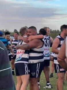 Ardmona players celebrate after the game.