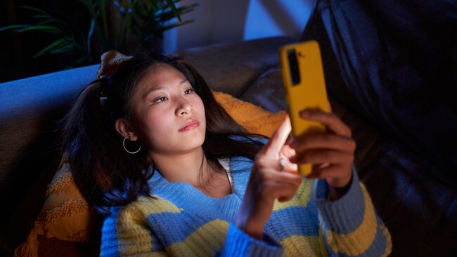 Try to minimise screens before bed to help you relax. Image: Getty