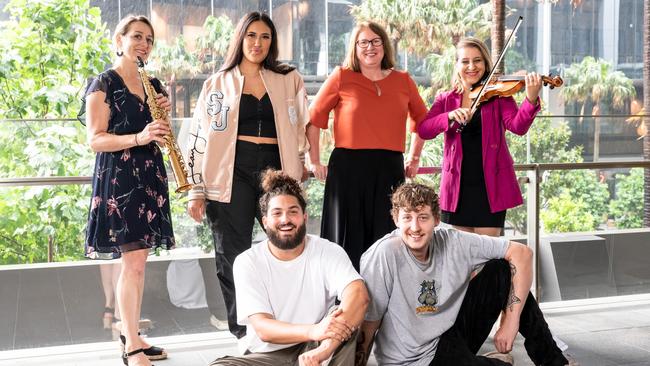 Parramatta Lord Mayor Donna Davis (back row, third from left) with artists Loretta Palmeiro, DJ Talisha, Mandie Vieira and (front) Korgy’s Peter Sabbagh and Tom Elliott.