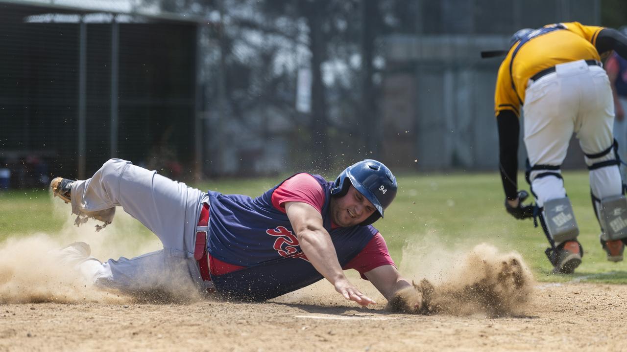 Laurie Taylor slides in safe for Toowoomba Rangers against Pine Hills Lightning in GBL division four baseball at Commonwealth Oval, Sunday, October 11, 2020. Picture: Kevin Farmer