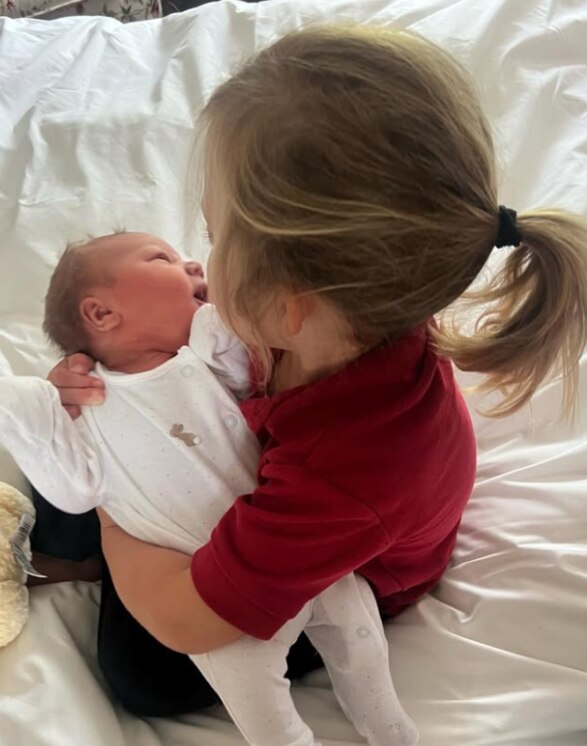 Romy with her little sister. Picture: Carrie Johnson/Instagram