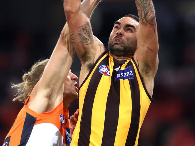 Hawthorn's Shaun Burgoyne spoiled by Giants Nick Haynes during AFL match between the GWS Giants and Hawthorn at Giants Stadium. Picture. Phil Hillyard