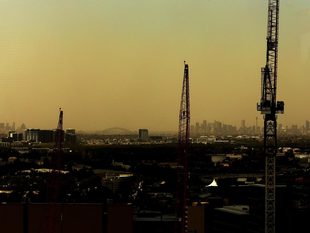 The dust over the Sydney CBD as seen from Parramatta as the storm approached. Picture: Jonathan Ng