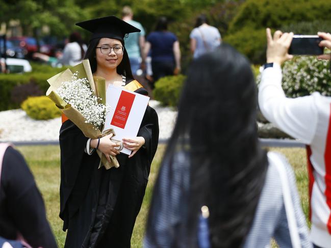 UTAS Graduations - Tasmanian School of Business and Economics and Graduate Research graduates are pictured before the ceremony. Picture: MATT THOMPSON