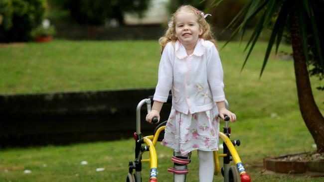 Chloe Blinco-Kregenbrink, 4, has shown courage beyond her years in learning to walk again after her body became paralysed. 