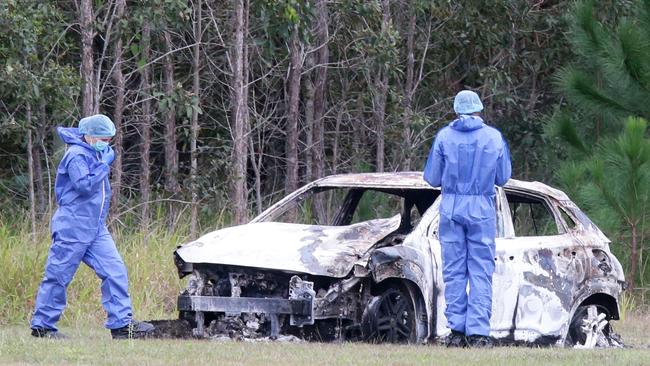 Police at the scene where 53-year-old police officer David Masters died attempting to stop a stolen car on the Bruce Highway on Saturday, 26th June 2021. Photo: Steve Pohlner