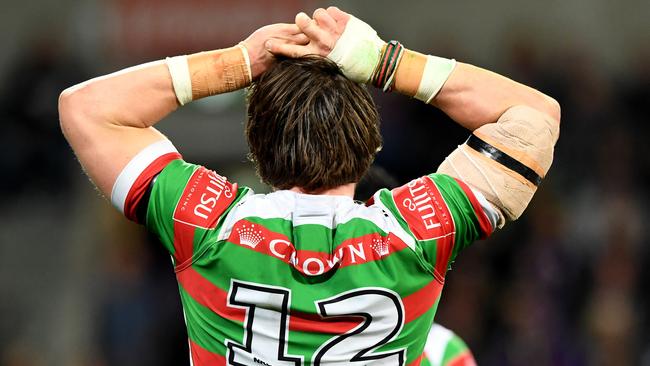 Angus Crichton of the Rabbitohs gestures after a try.
