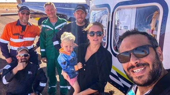 Ori Zavros, wife Lindsay Zavros and children Zoe and Zane with their rescuers. Picture: Supplied