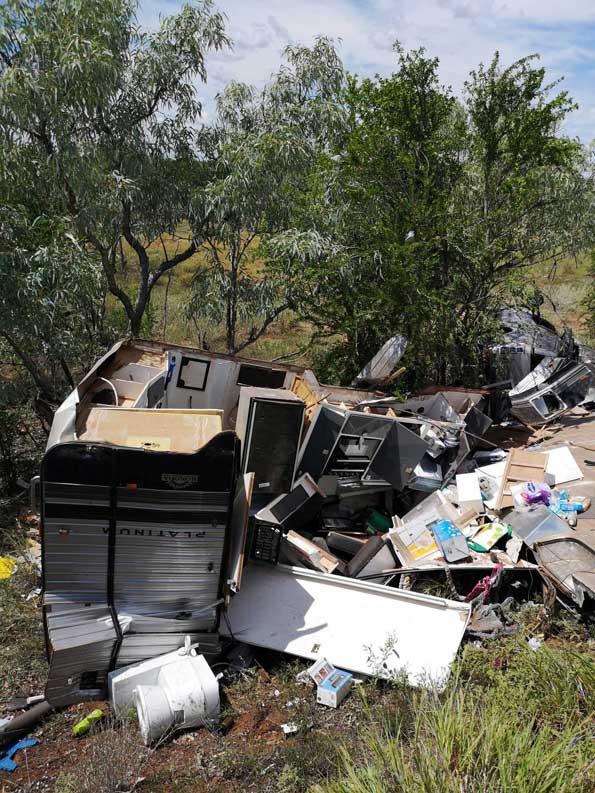 Jenni and Dave are lucky to be alive after their car and caravan crashed north of Elliott. Picture: SUPPLIED