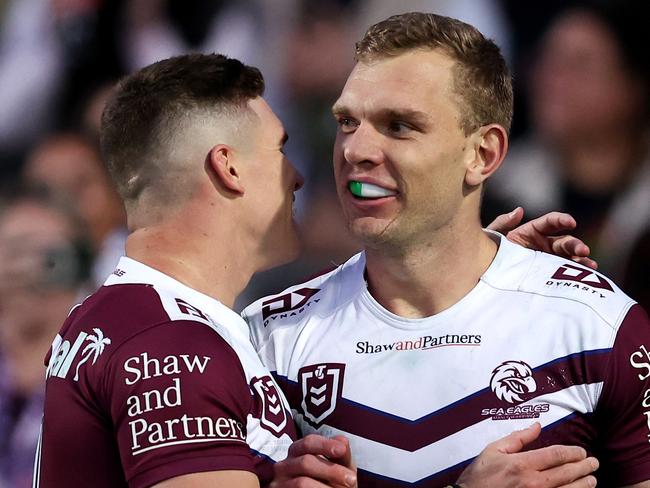 SYDNEY, AUSTRALIA - JULY 21: Tom Trbojevic of the Sea Eagles celebrates with team mate Reuben Garrick after scoring a try during the round 20 NRL match between Manly Sea Eagles and Gold Coast Titans at 4 Pines Park, on July 21, 2024, in Sydney, Australia. (Photo by Brendon Thorne/Getty Images)