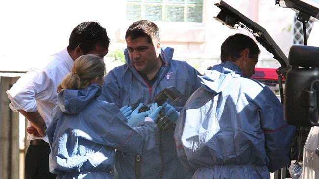  Police at the scene of Tyrell Cobb’s death in Biggera Waters in 2009. 