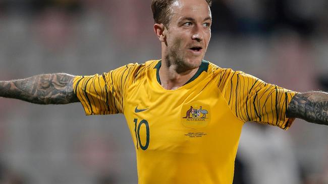 Australia's forward Adam Taggart celebrates his goal during the Group B FIFA World Cup 2022 and the 2023 AFC Asian Cup qualifying football match between Jordan and Australia in the Jordanian capital Amman on November 14, 2019. (Photo by Ahmad ALAMEEN / AFP)