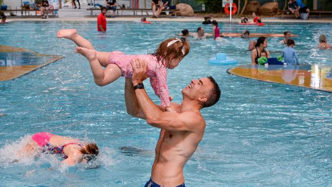 Peter Malinauskas with his daughter Eliza at the Adelaide Aquatic Centre in North Adelaide in February, where he announced plans to redevelop the site. Picture: Brenton Edwards