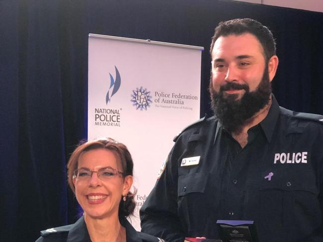 Senior Constable Mark Turner (pictured with Senior Constable Linda Farrand) is expected to win Labor preselection for Blain. Picture: NTPA