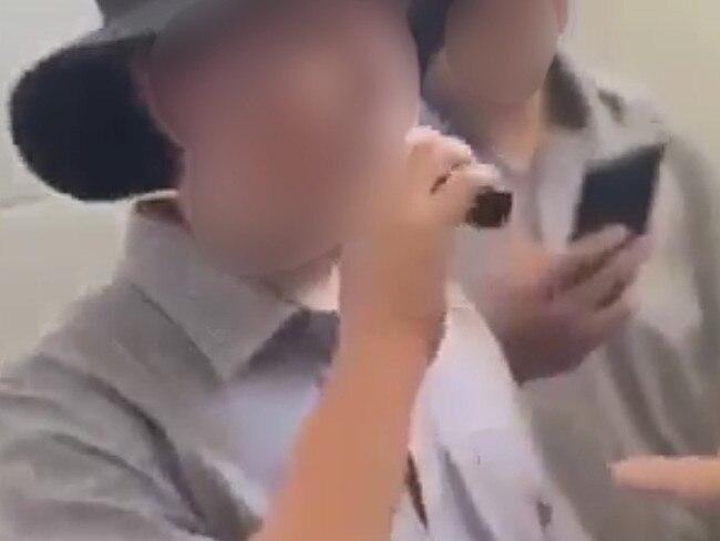 The video showed a number of students using a vape and using lewd language.