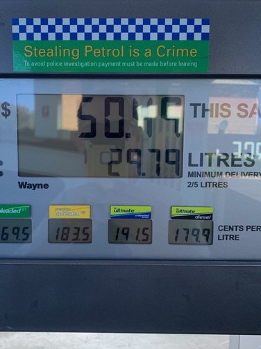 Michael Dunn’s photo of the petrol pump price after he filled a 20 litre and a 5 litre container, showing the pump supposedly dispensed 29.79 litres. Picture: Michael Dunn