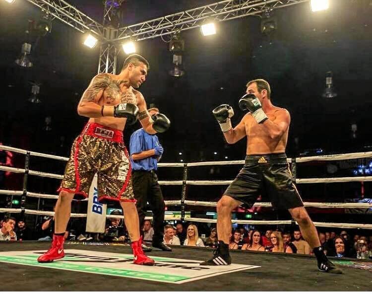 WIN: Adam Stowe (right) knocked out his opponent, Brisbane boxer Timani Taupau, in the third round of Kingscliff Boxing Stables' international event Boxing Mania 2. Picture: Contributed