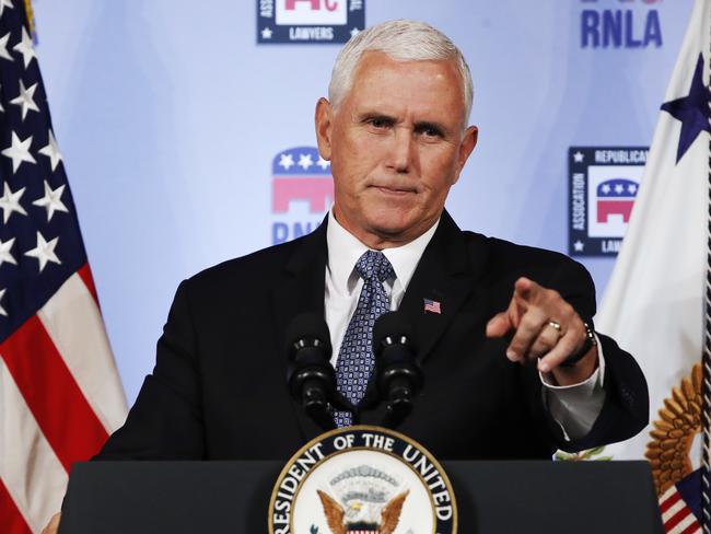 FILE - In this Aug. 24, 2018 file photo, Vice President Mike Pence gestures while speaking to the Republican National Lawyers Association in Washington. President Donald Trump is lashing out against the anonymous senior official who wrote an opinion piece in The New York Times.  Washington is consumed by a wild guessing game as to the identity of the writer, and swift denials of involvement in the op-ed came Thursday from top administration officials, including from Vice President Mike Pence's office, Secretary of State Mike Pompeo and Dan Coats, director of national intelligence, and other Cabinet members.  (AP Photo/Jacquelyn Martin)