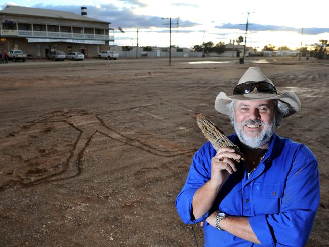 Marree Hotel Publican Phil Turner pictured out front of his pub wants the eroding Marree Man restored. Picture: Tricia Watkinson.