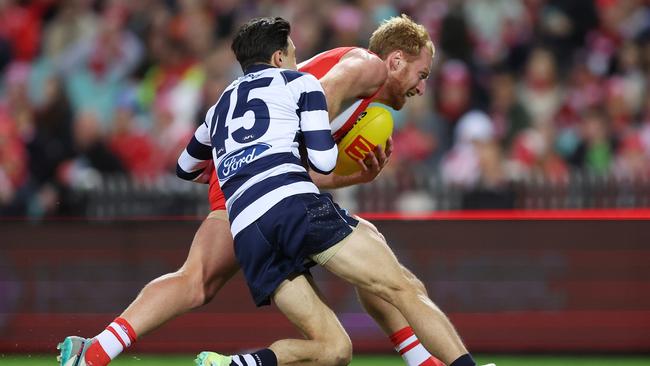 Brad Close tackling Aaron Francis on Friday night. Picture: Mark Metcalfe/AFL Photos/via Getty Images