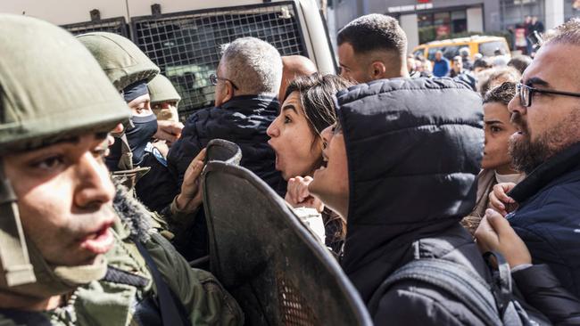 Protesters clash with Palestinian Authority forces in Ramallah during US Secretary of State Blinken’s meet with the Palestinian president, amidst ongoing Middle East tensions. Picture: Marco Longari/AFP