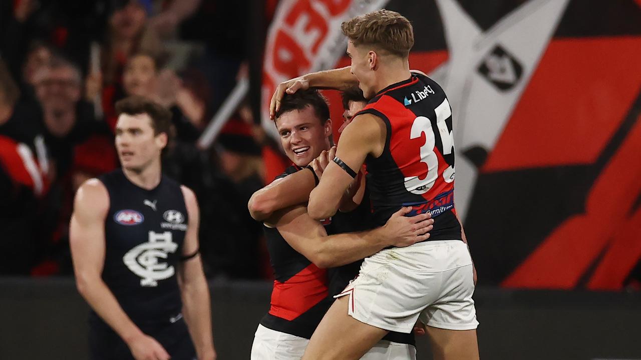 MELBOURNE - June 11 : AFL. Nic Martin of the Bombers celebrates a 3rd quarter goal during the round 13 AFL match between Carlton and Essendon at the MCG on June 11, 2023, in Melbourne, Australia. Photo by Michael Klein.