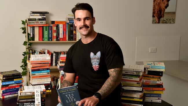 Captain Dylan Conway launched Brothers N Books to promote reading as a way of healing from trauma, pain. Picture: Evan Morgan