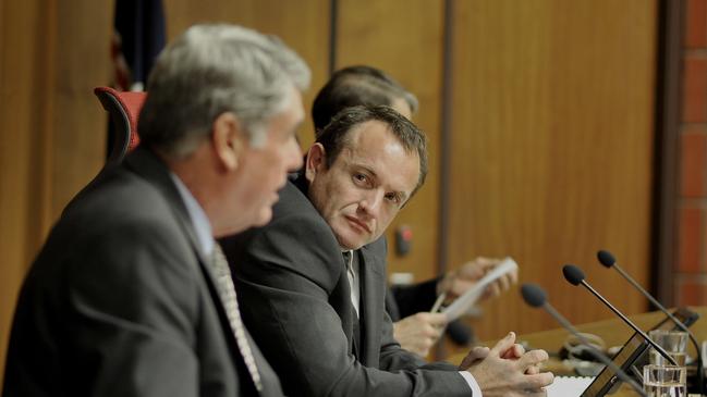 Mayor Allan Sutherland and Cr Adrian Raedel during a Moreton Bay Regional Council meeting last year. The council has appointed an external company to carry out an organisational review of its inner workings. Picture: Bradley Cooper.