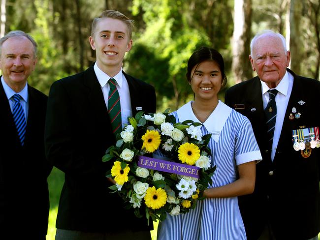 Riverstone MP Kevin Conolly, St John Paul II Catholic College leaders Mitchell Brooks and Johanna Bobcats and Les Gibson of Nirimba Naval Association.