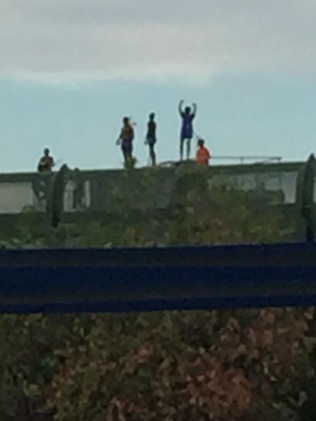 Youth on the roof of the Cleveland Youth Detention Centre in Townsville during the 2016 riot. Picture: Domanii Cameron