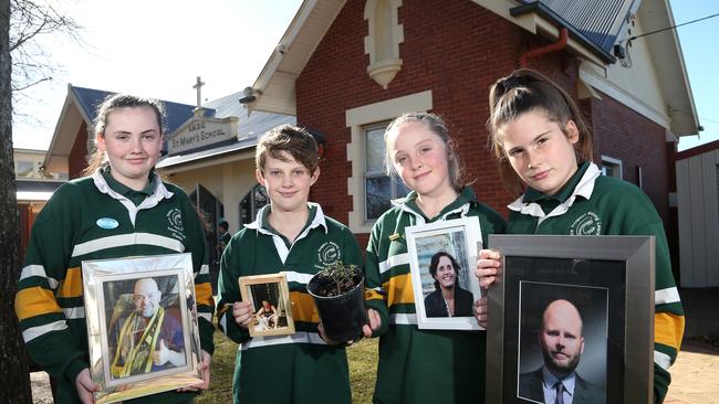 (L - R) Sophie, Angus, Eliza and Scheldon’s late parents will be honoured through a memorial garden at the school. Picture: Hamish Blair