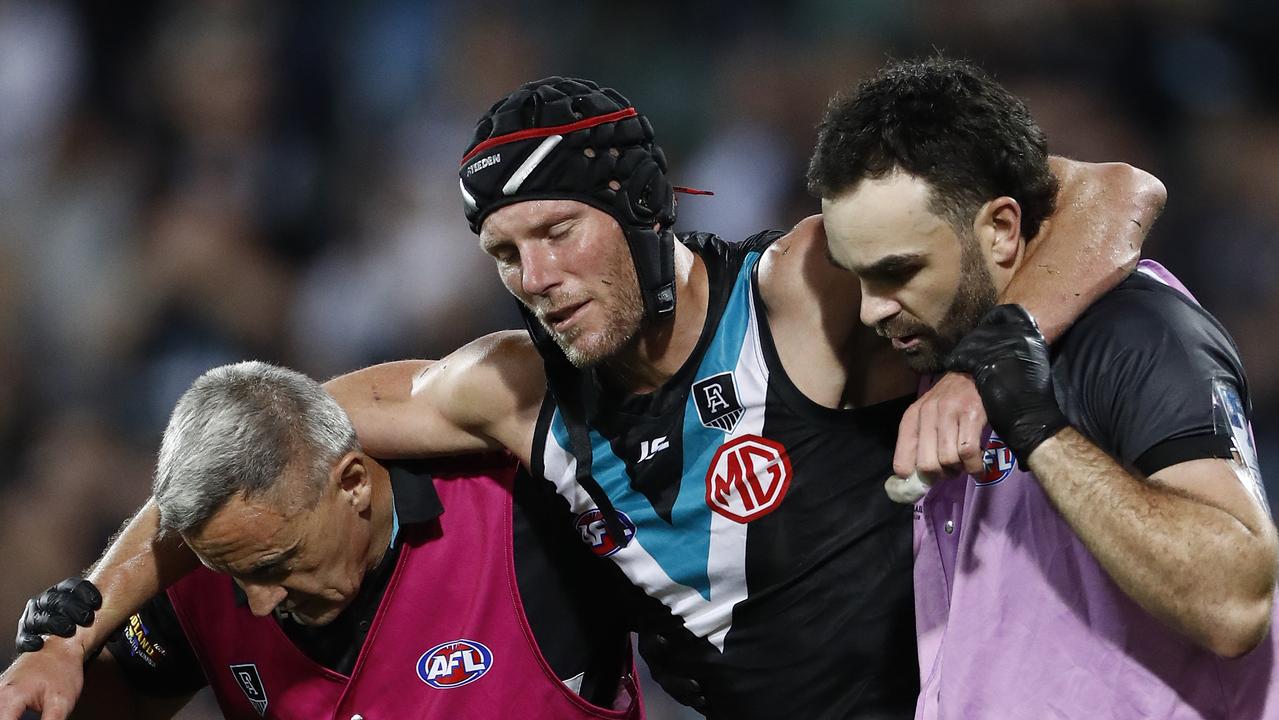 Brad Ebert is taken from the ground after suffering a concussion during preliminary final against the Tigers at Adelaide Oval. Picture: Getty Images