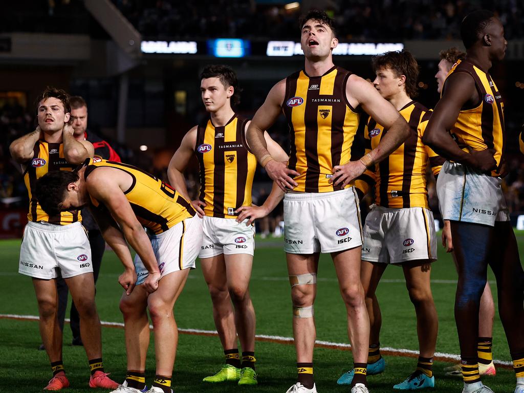 ADELAIDE, AUSTRALIA - SEPTEMBER 13: Hawks players look dejected after a loss during the 2024 AFL Second Semi Final match between the Port Adelaide Power and the Hawthorn Hawks at Adelaide Oval on September 13, 2024 in Adelaide, Australia. (Photo by Michael Willson/AFL Photos via Getty Images)