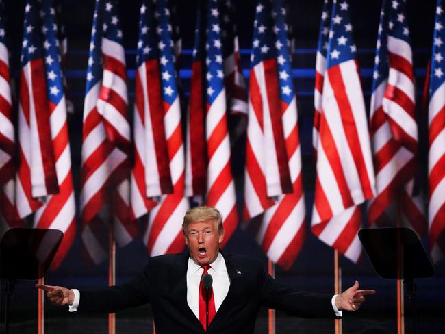 CLEVELAND, OH - JULY 21: Republican presidential candidate Donald Trump delivers a speech during the evening session on the fourth day of the Republican National Convention on July 21, 2016 at the Quicken Loans Arena in Cleveland, Ohio. Republican presidential candidate Donald Trump received the number of votes needed to secure the party's nomination. An estimated 50,000 people are expected in Cleveland, including hundreds of protesters and members of the media. The four-day Republican National Convention kicked off on July 18. Alex Wong/Getty Images/AFP == FOR NEWSPAPERS, INTERNET, TELCOS & TELEVISION USE ONLY ==