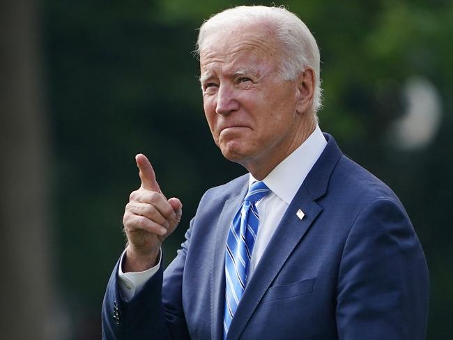 US President Joe Biden speaks departs the White House in Washington, DC from the South Lawn, on October 5, 2021. - Biden is travelling to Michigan to speak about his infrastructure bill and Build Back Better agenda. (Photo by MANDEL NGAN / AFP)