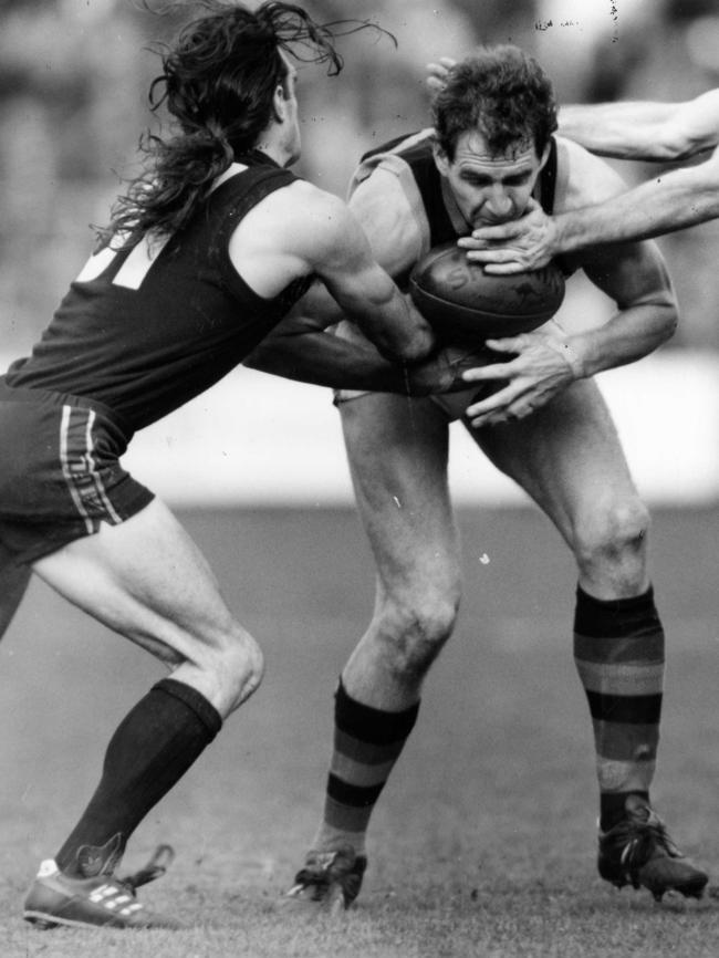 Mickan in action for the Crows against Carlton in 1992.