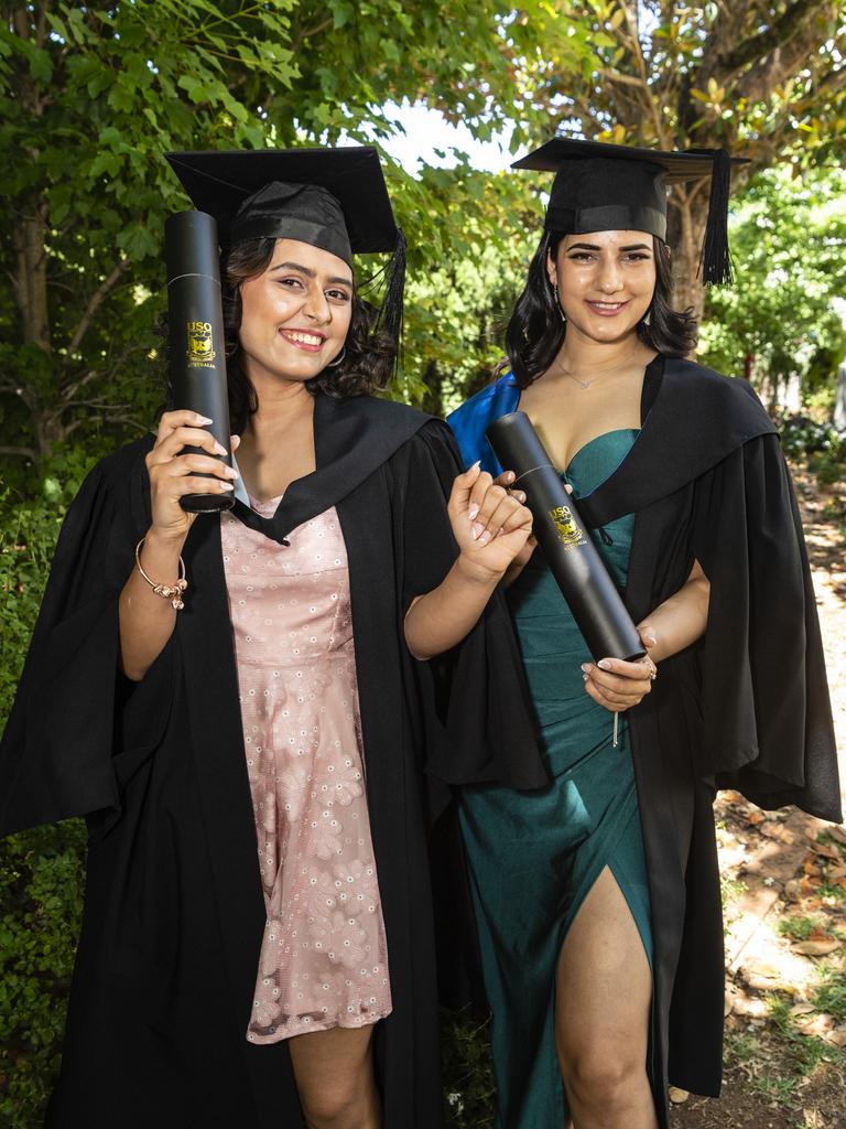 Bachelor of Business graduate Aastha Pandey (left) and Bachelor of Nursing graduate Srijana Kattel at the UniSQ graduation ceremony at Empire Theatres, Wednesday, December 14, 2022.