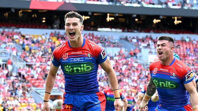 David Armstrong of the Knights celebrates after scoring a try during the round eight NRL match between Dolphins and Newcastle Knights at Suncorp Stadium. Photo: Bradley Kanaris/Getty Images