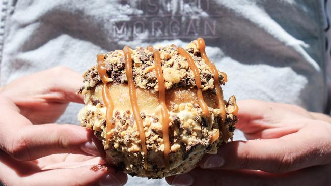 The Golden Gaytime Ice Cream Sandwich, complete with honeycomb ice cream-filled doughnut, Gaytime crumb and a salted caramel drizzle. Picture: Supplied